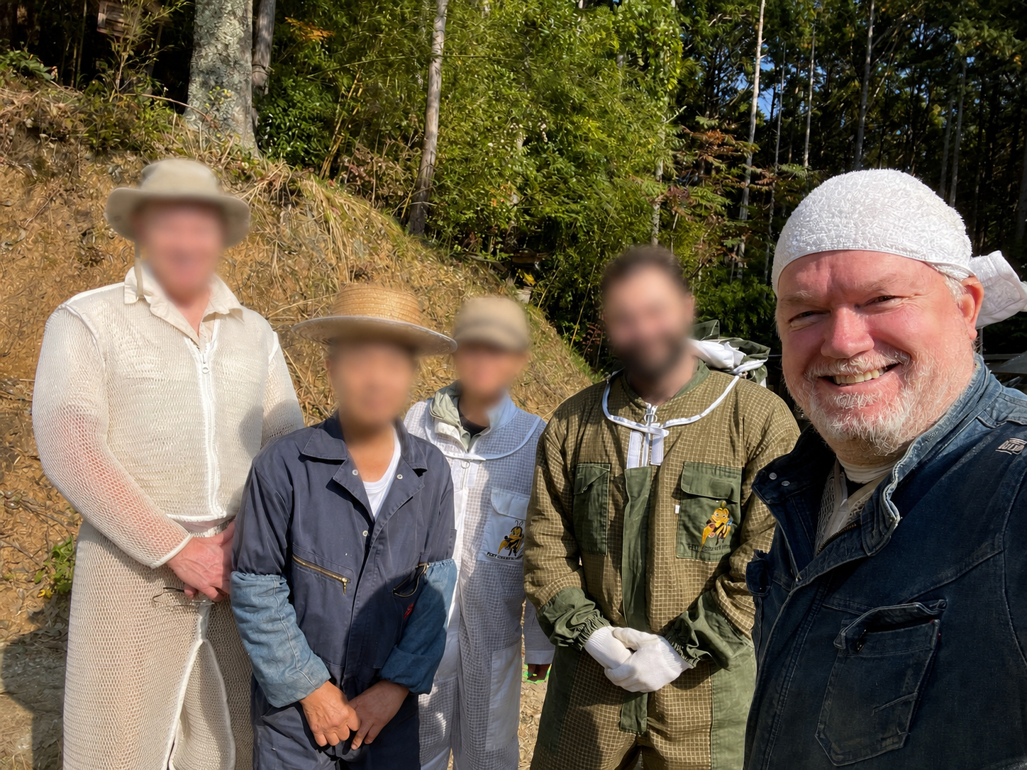 Michael J Trout with a community work group on the hillside